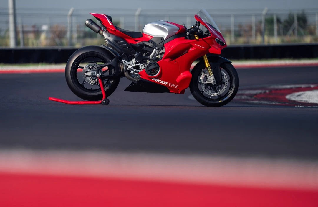 Ducati Panigale V4 R on a paddock stand beside the racing circuit